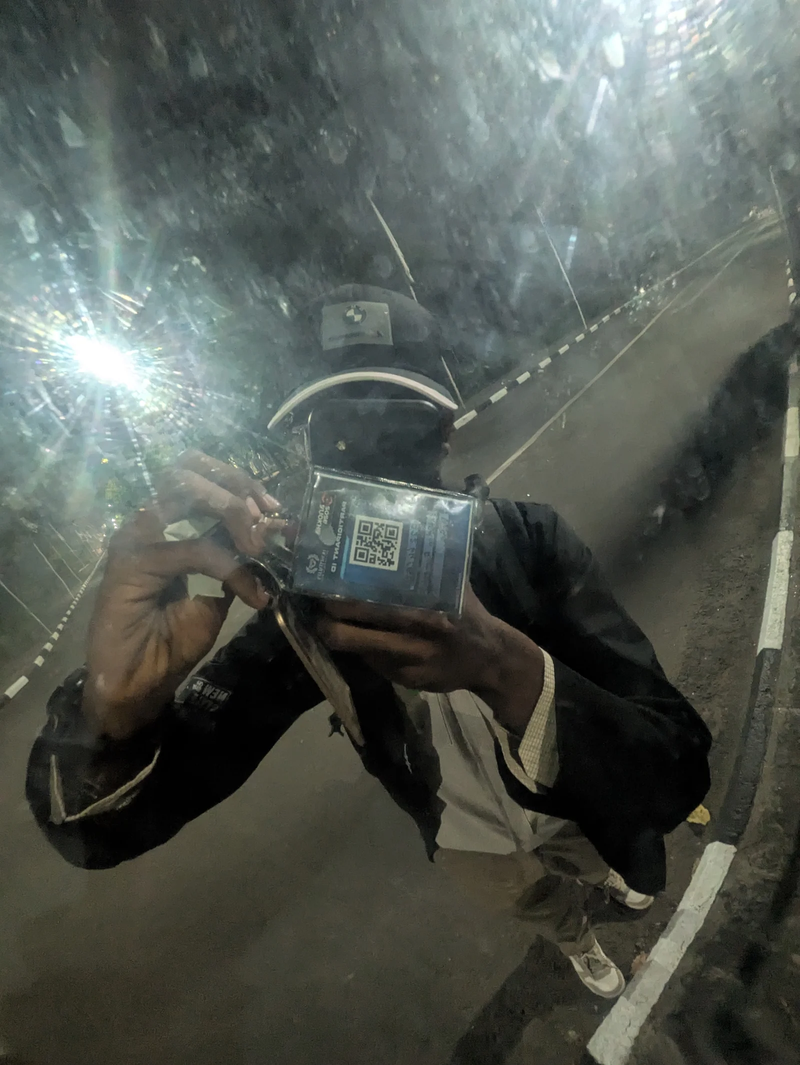 pics/final/jan-6_flashing-id-card-on-parking-mirror.webp